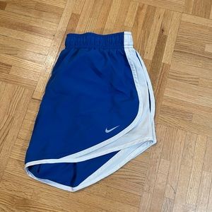 royal blue women’s tempo nike running shorts
